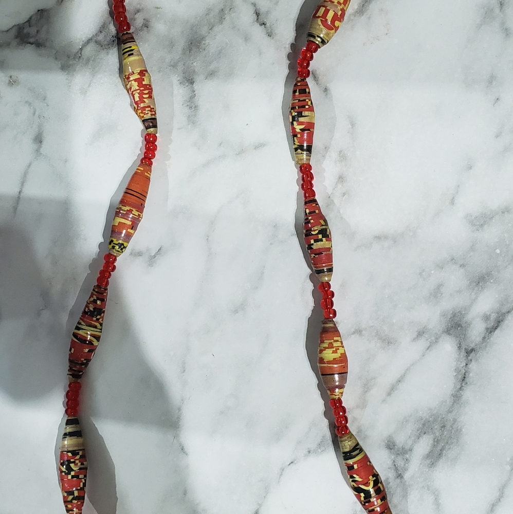 Hand made paper necklaces.